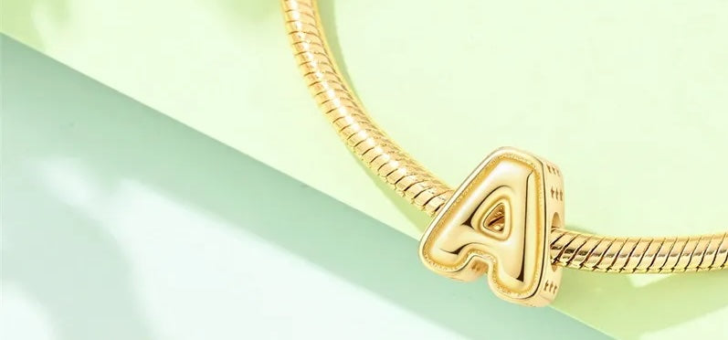 Gold initial charm for bracelet